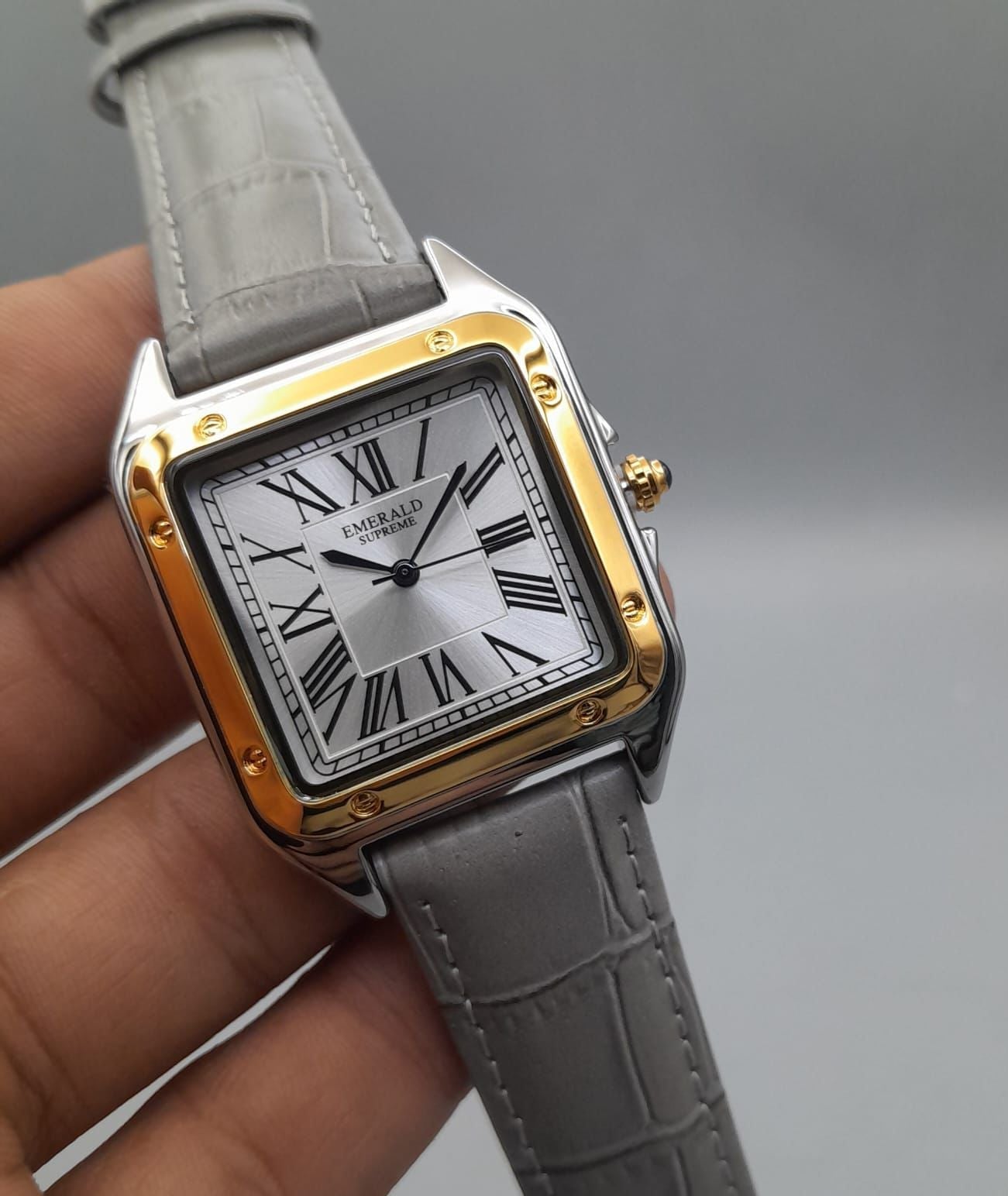 The Emerald Supreme cubex model golden dial watches