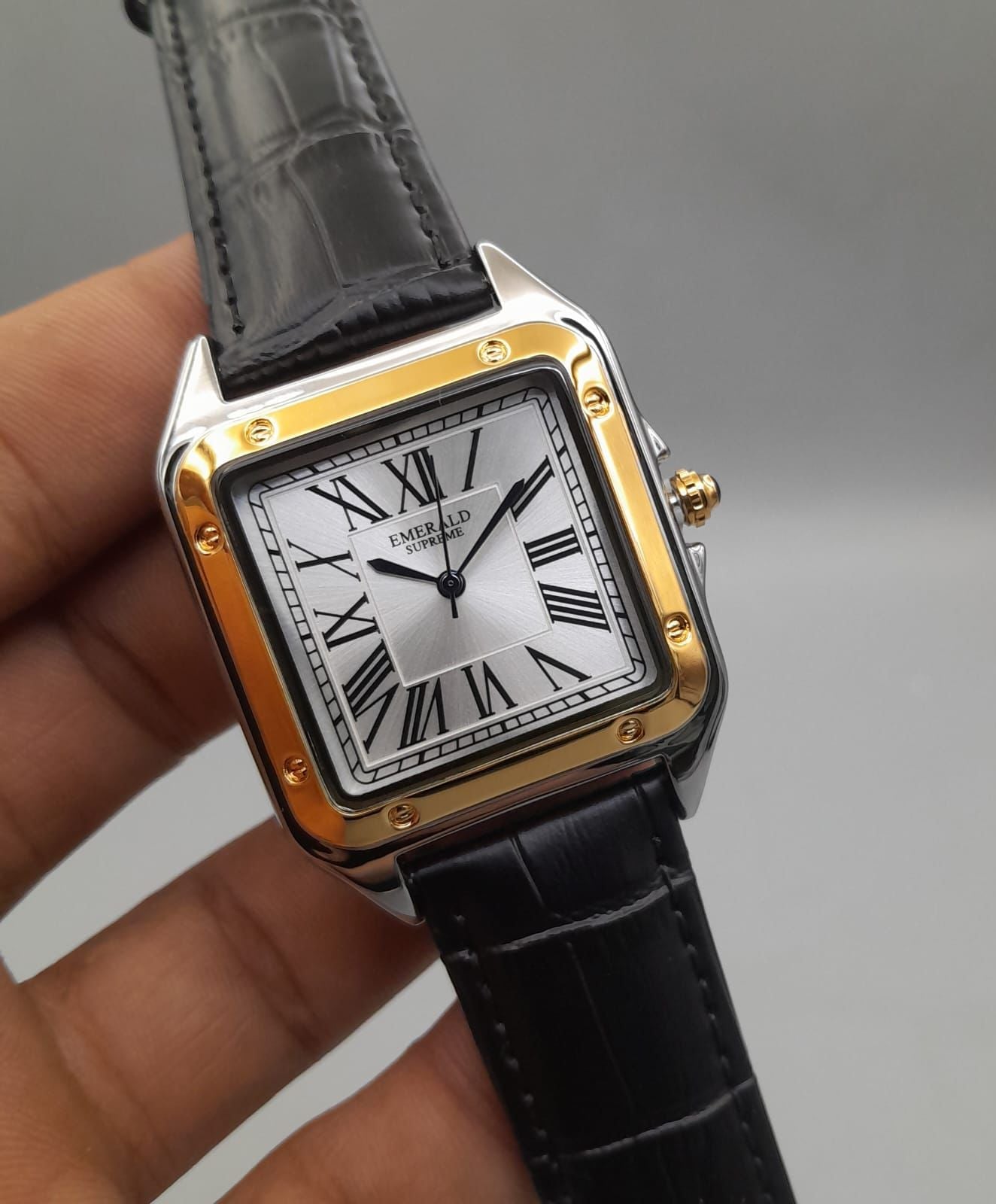The Emerald Supreme cubex model golden dial watches