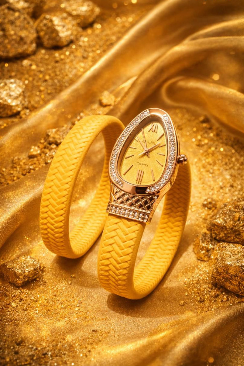 Gold watch with yellow strap on a gold background